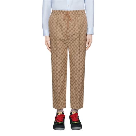 pantaloncini gucci uomo falso|Gucci Pantalone in tessuto GG con GG in pelle.